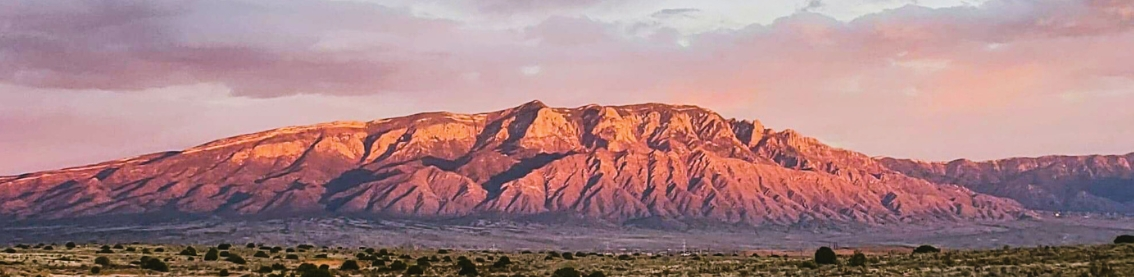 The western face of the Sandia mountains at sunset