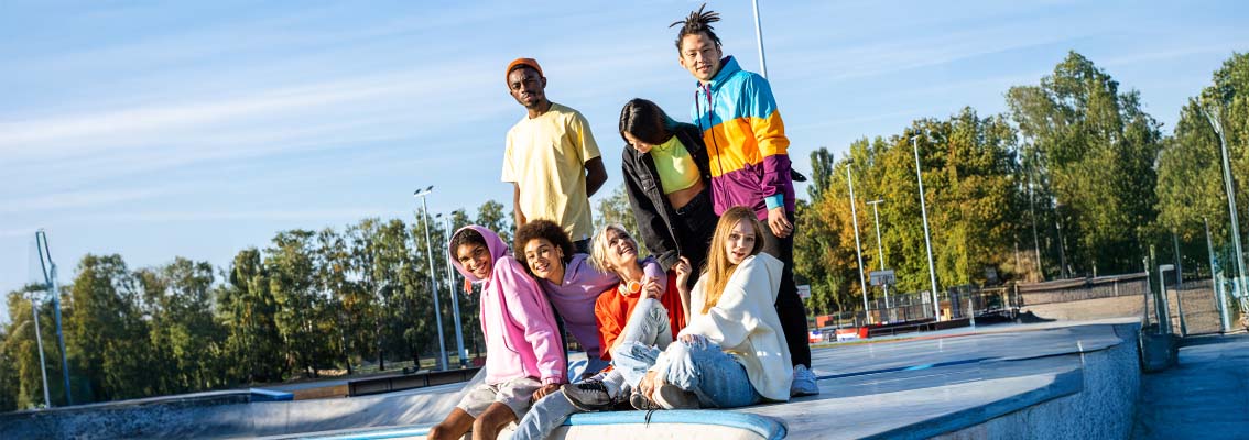 Teenagers hanging out at a park
